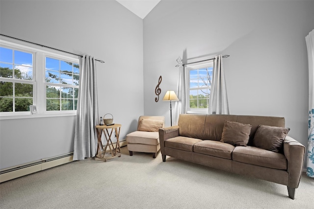 7 Pilgrim Ln, Washingtonville, NY 10992 - carpeted living room with plenty of natural light, a baseboard radiator, and high vaulted ceiling