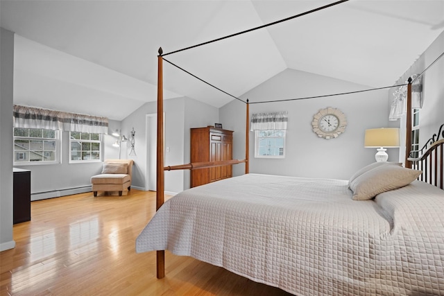 7 Pilgrim Ln, Washingtonville, NY 10992 - bedroom with a baseboard radiator, lofted ceiling, and wood finished floors