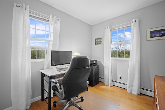 7 Pilgrim Ln, Washingtonville, NY 10992 - office space featuring healthy amount of natural light, wood finished floors, and a baseboard radiator