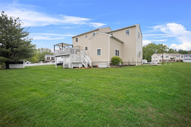 7 Pilgrim Ln, Washingtonville, NY 10992 - rear view of house with a deck, a yard, stairs, and central AC unit
