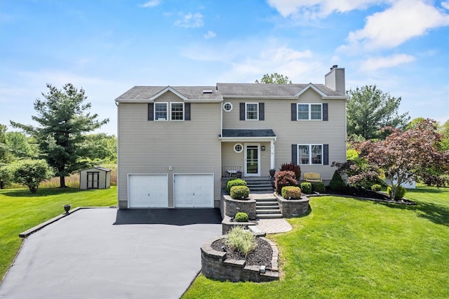 7 Pilgrim Ln, Washingtonville, NY 10992 - view of front facade featuring a chimney, a garage, a front yard, and driveway