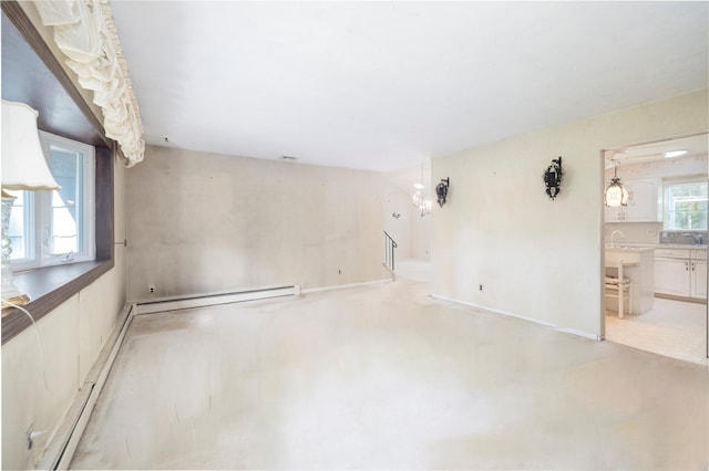 810 Tooker Ave, West Babylon, NY 11704 - empty room with a baseboard radiator