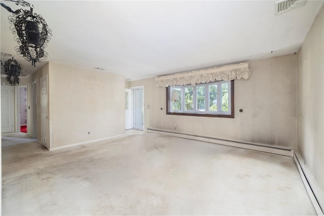 810 Tooker Ave, West Babylon, NY 11704 - spare room with baseboard heating and concrete floors