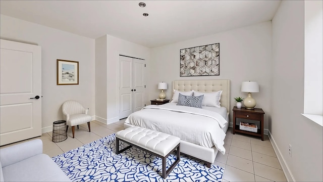 7252 Metropolitan Ave Unit 2B, Middle Village, NY 11379 - bedroom featuring light tile patterned flooring and a closet