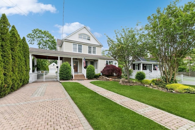 57 Maple Ave, Bay Shore, NY 11706 - view of front of property featuring a porch, decorative driveway, a shingled roof, and a carport