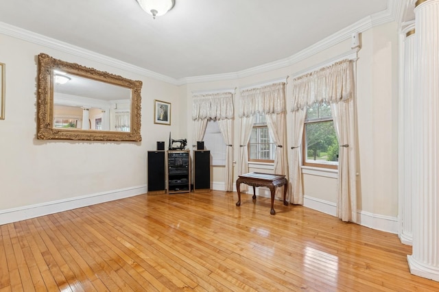 57 Maple Ave, Bay Shore, NY 11706 - interior space with hardwood / wood-style flooring, crown molding, and baseboards