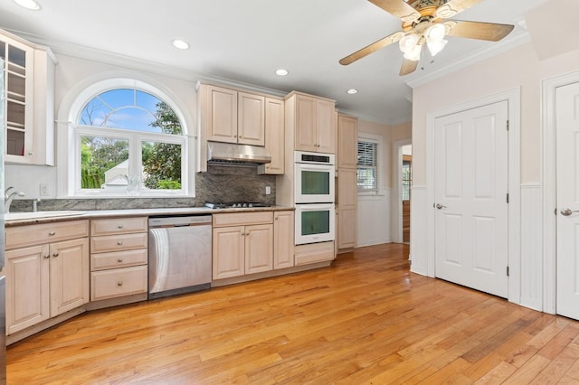 57 Maple Ave, Bay Shore, NY 11706 - kitchen with dishwasher, white double oven, crown molding, under cabinet range hood, and light wood-style floors