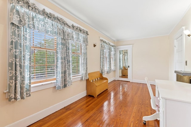 57 Maple Ave, Bay Shore, NY 11706 - sitting room featuring baseboards, hardwood / wood-style flooring, and crown molding