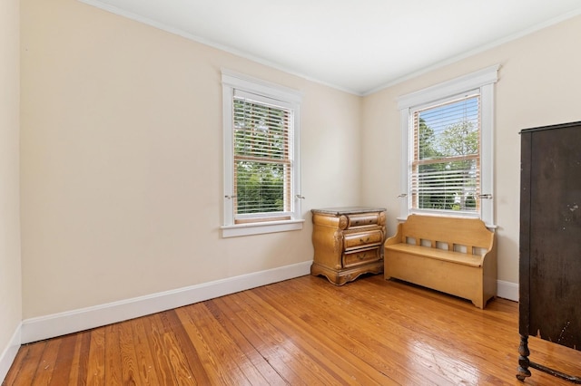 57 Maple Ave, Bay Shore, NY 11706 - sitting room with baseboards, light wood-style flooring, and ornamental molding
