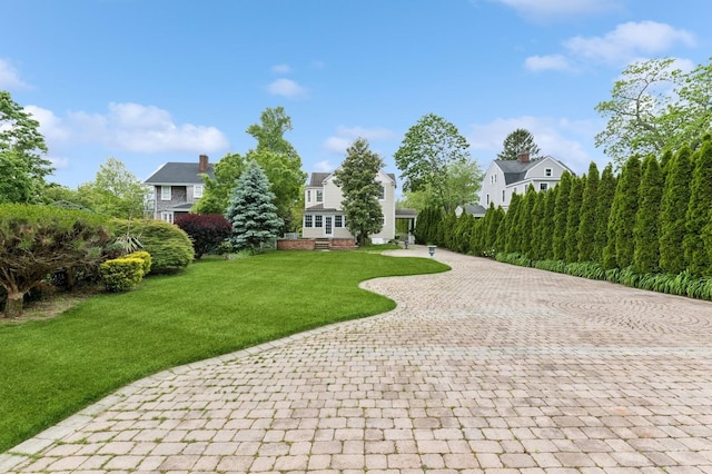 57 Maple Ave, Bay Shore, NY 11706 - surrounding community featuring decorative driveway and a yard