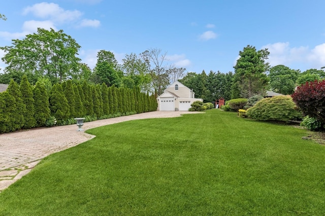 57 Maple Ave, Bay Shore, NY 11706 - view of green lawn featuring concrete driveway