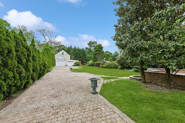 57 Maple Ave, Bay Shore, NY 11706 - view of front of home with a garage and a front lawn
