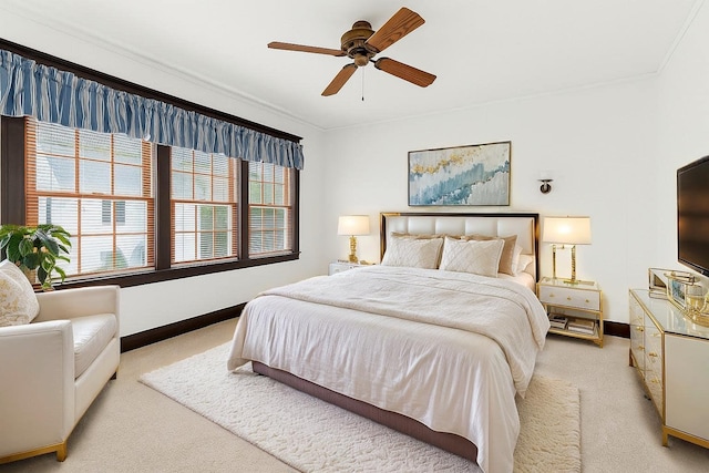 57 Maple Ave, Bay Shore, NY 11706 - bedroom with light carpet, baseboards, crown molding, and a ceiling fan