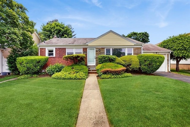 29 Melanie Ln, Syosset, NY 11791 - ranch-style house with a front yard, brick siding, asphalt driveway, and an attached garage