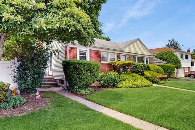 29 Melanie Ln, Syosset, NY 11791 - view of front of home with a front yard and brick siding
