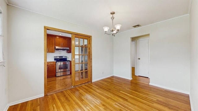 29 Melanie Ln, Syosset, NY 11791 - unfurnished dining area featuring a chandelier, light wood-style floors, crown molding, and baseboards
