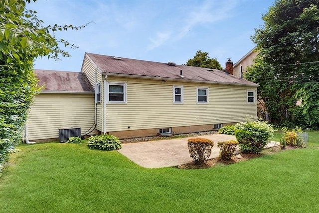 29 Melanie Ln, Syosset, NY 11791 - back of property featuring a patio, a yard, and central air condition unit