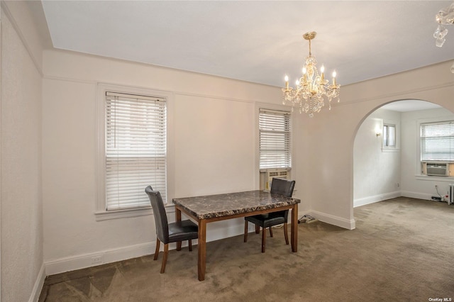 53-42 63rd St, Maspeth, NY 11378 - carpeted dining area with arched walkways, a chandelier, baseboards, and cooling unit