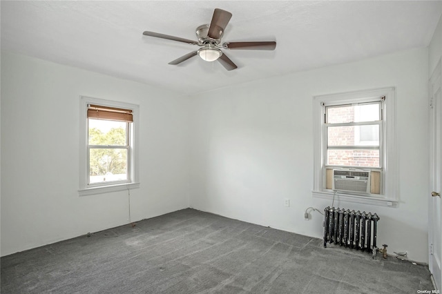 53-42 63rd St, Maspeth, NY 11378 - spare room with plenty of natural light, radiator, and carpet floors