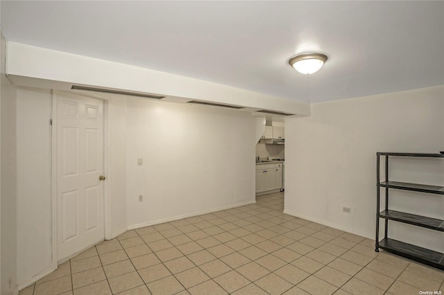 53-42 63rd St, Maspeth, NY 11378 - finished basement featuring baseboards and a sink
