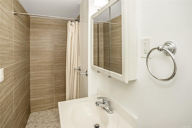 53-42 63rd St, Maspeth, NY 11378 - bathroom featuring tiled shower and a sink
