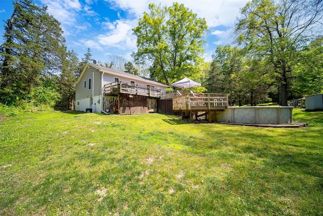 287 Norton Rd, Red Hook, NY 12571 - view of grassy yard with a wooden deck and a garage