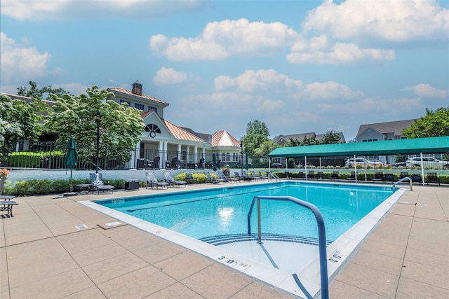 100 Harbor View Dr Unit 607, Port Washington, NY 11050 - community pool featuring a patio area