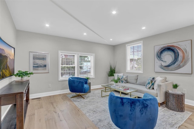 2614 Milburn Ave, Baldwin, NY 11510 - living room with wood finished floors, recessed lighting, and baseboards