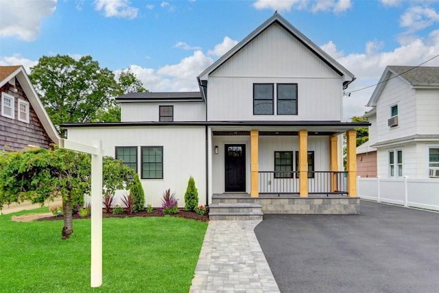 2614 Milburn Ave, Baldwin, NY 11510 - modern farmhouse with a porch