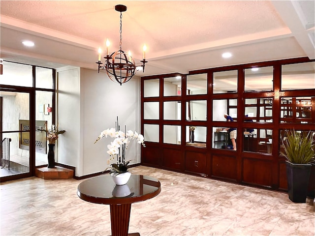 325 King St Unit 6J, Port Chester, NY 10573 - foyer featuring a chandelier, recessed lighting, and baseboards