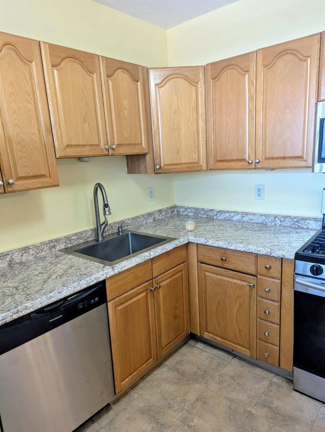 325 King St Unit 6J, Port Chester, NY 10573 - kitchen with appliances with stainless steel finishes and light stone countertops