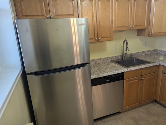 325 King St Unit 6J, Port Chester, NY 10573 - kitchen featuring stainless steel appliances and light stone counters