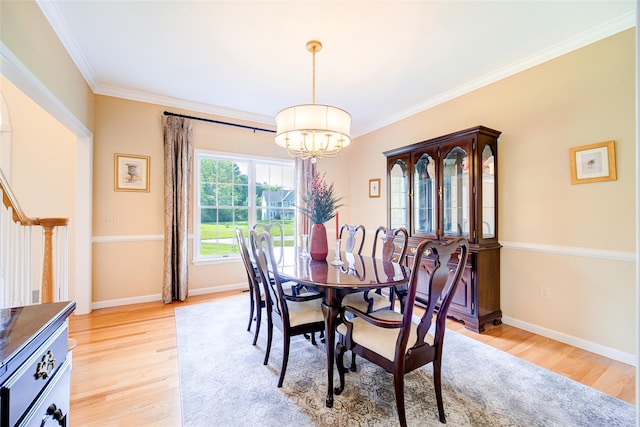 2 Marion Way, Lagrangeville, NY 12540 - dining room featuring a chandelier, light wood-type flooring, and ornamental molding
