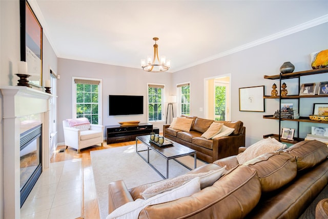 2 Marion Way, Lagrangeville, NY 12540 - living area with ornamental molding, a premium fireplace, a chandelier, and light tile patterned floors