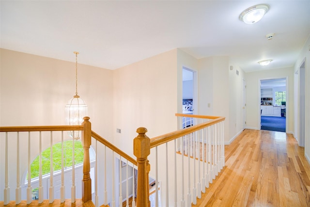 2 Marion Way, Lagrangeville, NY 12540 - corridor with an upstairs landing and light wood finished floors