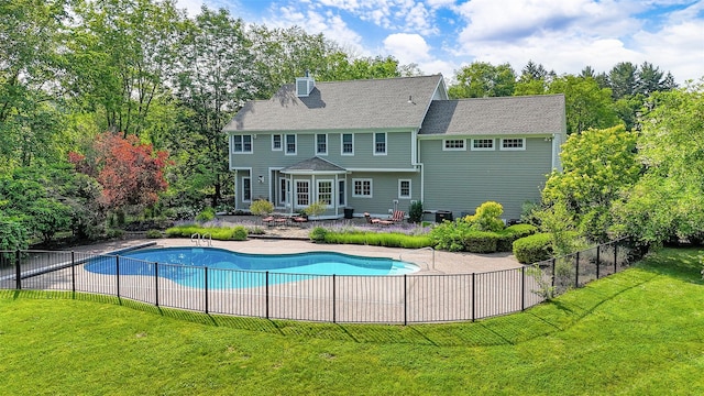 2 Marion Way, Lagrangeville, NY 12540 - rear view of house featuring a patio area and a chimney