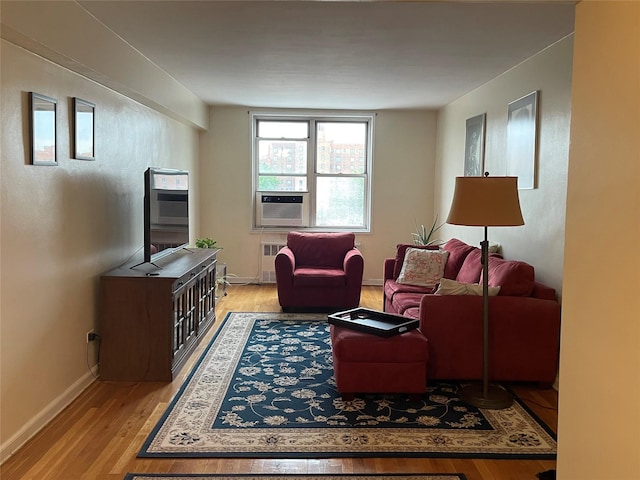 1430 Thieriot Ave Unit 6J, Bronx, NY 10460 - living area with light wood-type flooring, baseboards, radiator heating unit, and cooling unit