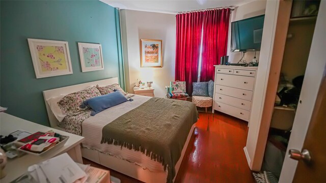 5214 92nd St, Elmhurst, NY 11373 - bedroom featuring dark wood finished floors