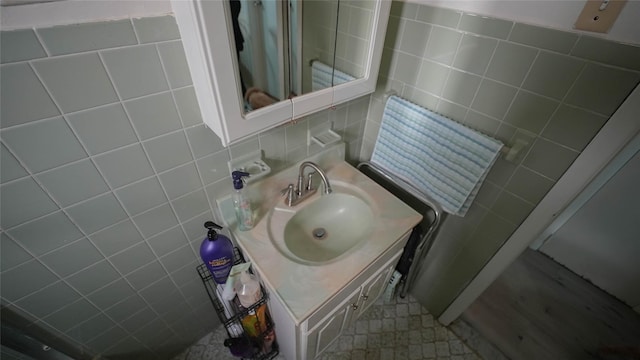 5214 92nd St, Elmhurst, NY 11373 - bathroom with tile walls, vanity, and decorative backsplash