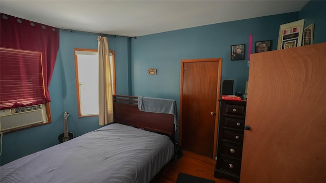 5214 92nd St, Elmhurst, NY 11373 - bedroom featuring wood finished floors and cooling unit