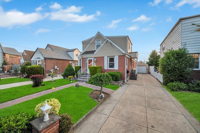 56 Mary St, Valley Stream, NY 11580 - view of front of house with brick siding, a detached garage, and an outdoor structure