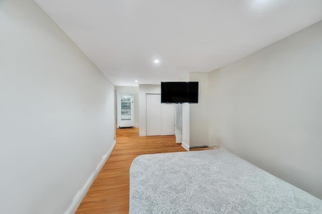 56 Mary St, Valley Stream, NY 11580 - unfurnished bedroom featuring light wood-type flooring, recessed lighting, and baseboards