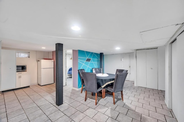 56 Mary St, Valley Stream, NY 11580 - dining room featuring light tile patterned flooring and recessed lighting