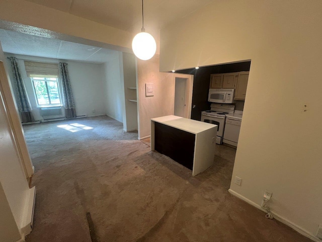 160 Academy St Unit 1F, Poughkeepsie, NY 12601 - kitchen with white appliances, light colored carpet, light countertops, hanging light fixtures, and a center island