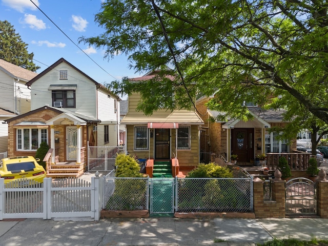 12104 Linden Blvd, South Ozone Park, NY 11420 - view of front of home with a gate and a fenced front yard