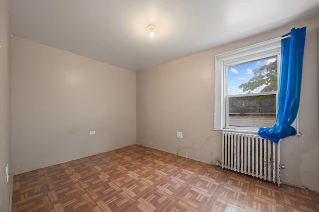 12104 Linden Blvd, South Ozone Park, NY 11420 - spare room with radiator heating unit