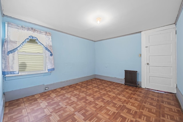 12104 Linden Blvd, South Ozone Park, NY 11420 - unfurnished room with radiator heating unit