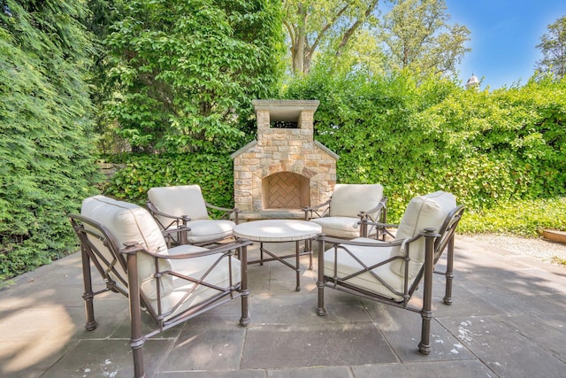 191 Elderfields Rd, Manhasset, NY 11030 - view of patio / terrace with an outdoor stone fireplace