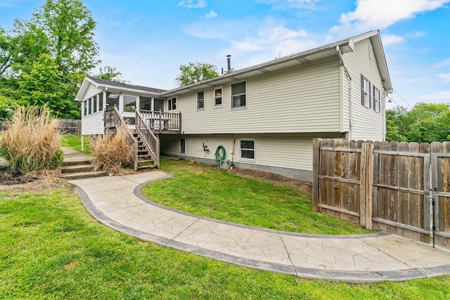 491 Toleman Rd, Rock Tavern, NY 12575 - back of house with a sunroom, stairway, and a wooden deck