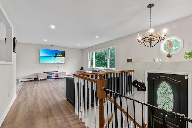 491 Toleman Rd, Rock Tavern, NY 12575 - entrance foyer featuring a baseboard heating unit, a chandelier, wood finished floors, recessed lighting, and baseboards